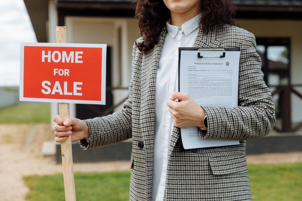 Red Home for Sale Sign - Choosing an Estate Agent
